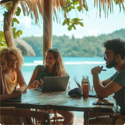 Anupam and a guest reviewing the trip on a laptop at the lodge.